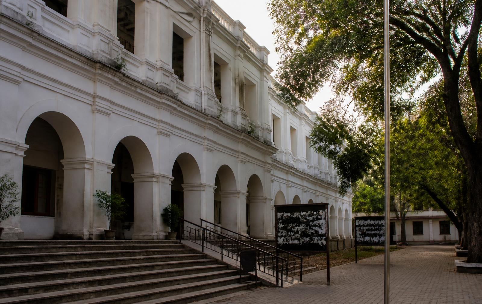 Indian district court complex with arched verandah and stone steps